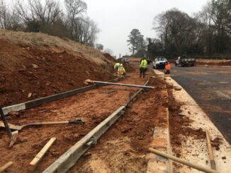 Contractors build new sidewalk along highway 81 in McDonough. (Georgia DOT photo)