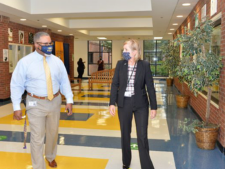Photo of Superintendent Mary Elizabeth Davis and ELMS Principal Malik Douglas (Henry County Schools photo)