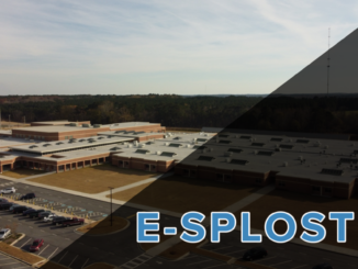Aerial photo of McDonough High School with words â€œE-SPLOST VIâ€ (staff photo)