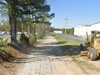 Streetview looking down a dirt surface Selfridge Road in Hampton (Google photo).