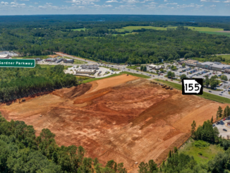 Photo shows aerial photo of state route 155 and Bill Gardner Parkway (Georgia Drone Pros photo with added road names).