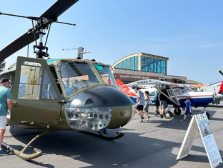 Photo shows a helicopter and airplanes at Atlanta Speedway Airport (Clayton Carte photo).