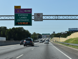 Photo shows I-75 North at the Express Lanes Entrance Ahead sign in McDonough, Henry County (AARoads photo).