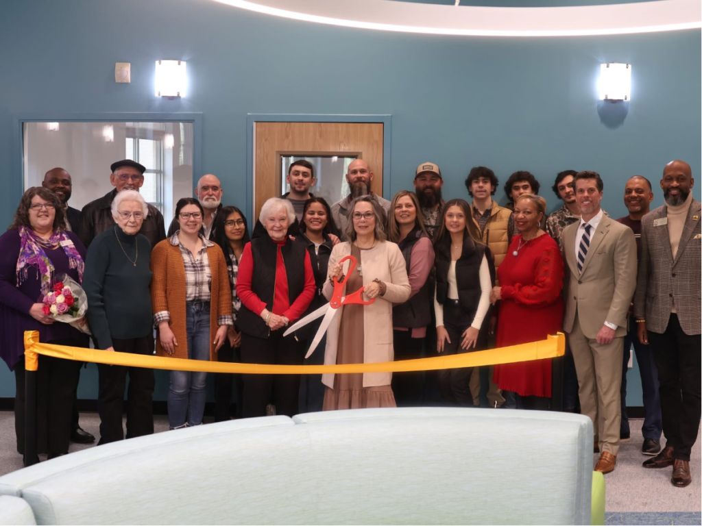 Members of the Barham family, state and local elected officials at the McDonough Library renovations ribbon-cutting, January 9, 2025 (Clayton Carte photo).