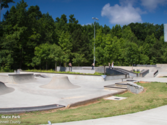 Photo shows a large skate park in a county park (Gwinnett County photo).