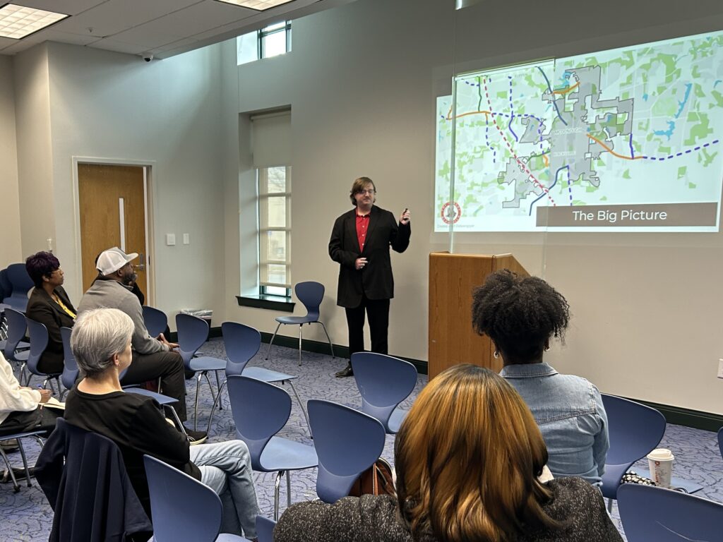 Clayton Carte speaks to a group of residents about Henry County transportation projects.