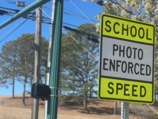 Photo shows a school zone photo enforced speed sign (Dalton Police Department photo).