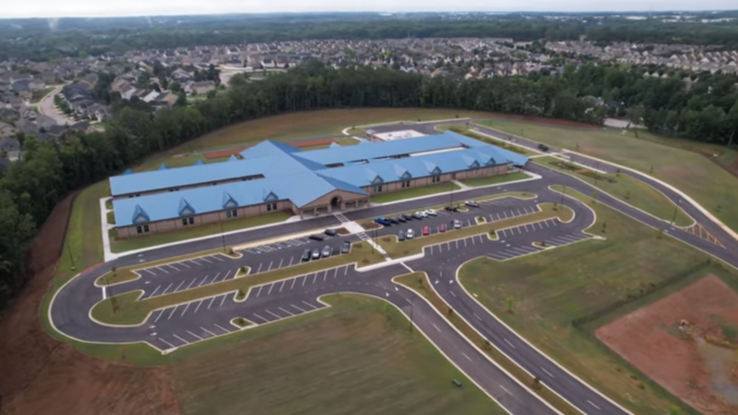 Birch Creek Elementary School Aerial photo shows Birch Creek Elementary School and the adjacent subdivisions in the background (Andrews, Hammock, & Powell, Inc. photo from Youtube).