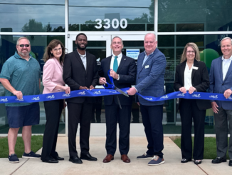 Photo shows Delta Community Credit Union staff, Henry County Chamber of Commerce and Locust Grove officials at the Delta Community Credit Union ribbon cutting on Monday, May 19, 2025 (Delta Community Credit Union photo).