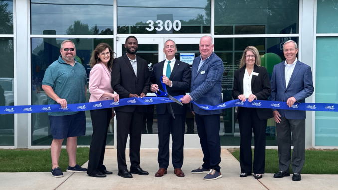 Photo shows Delta Community Credit Union staff, Henry County Chamber of Commerce and Locust Grove officials at the Delta Community Credit Union ribbon cutting on Monday, May 19, 2025 (Delta Community Credit Union photo).