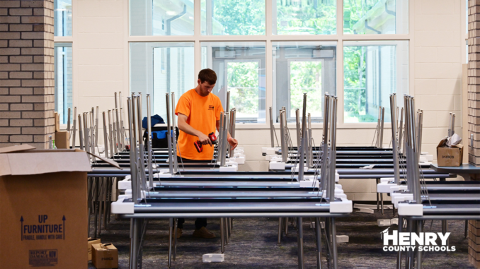 HCS Furniture Install Photo shows desks being assembled for Birch Creek Elementary School (Henry County Schools photo).