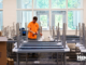 Photo shows desks being assembled for Birch Creek Elementary School (Henry County Schools photo).