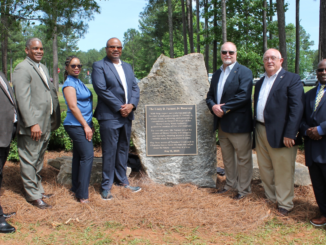 Image shows the Henry County Water Authority board, General Manager Tony Carnell and former General Manager Lindy Farmer at the Farmer Reservoir dedication in May 2025 (HCWA photo).