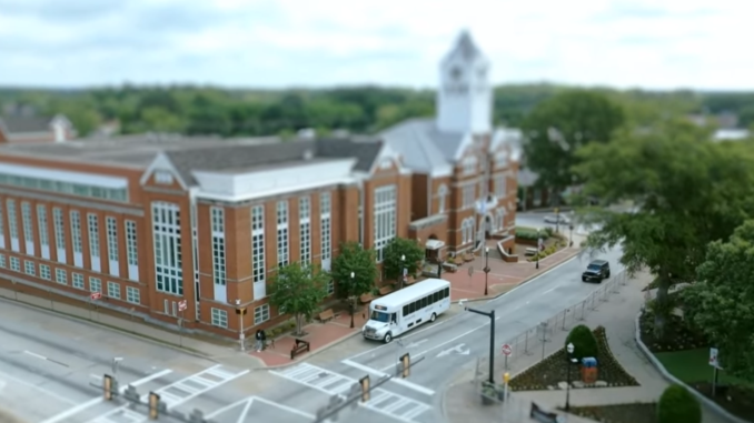 Henry County Bus at Courthouse Photo shows a Henry County Transit bus in front of the Henry County Courthouse (Henry County photo).